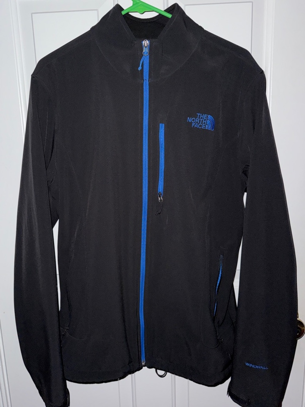The North Face Lightweight Men’s Jacket in Black with Blue Logo